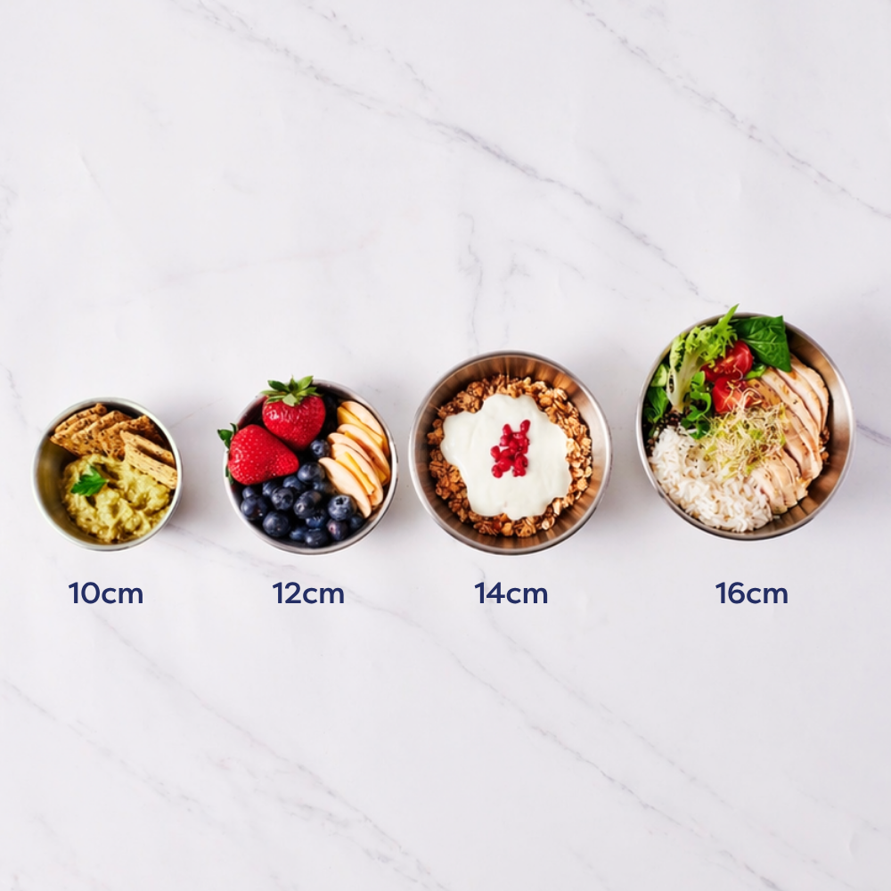 14cm stainless steel bowl with round edges, shown with granola, yogurt, and toppings on a marble surface.